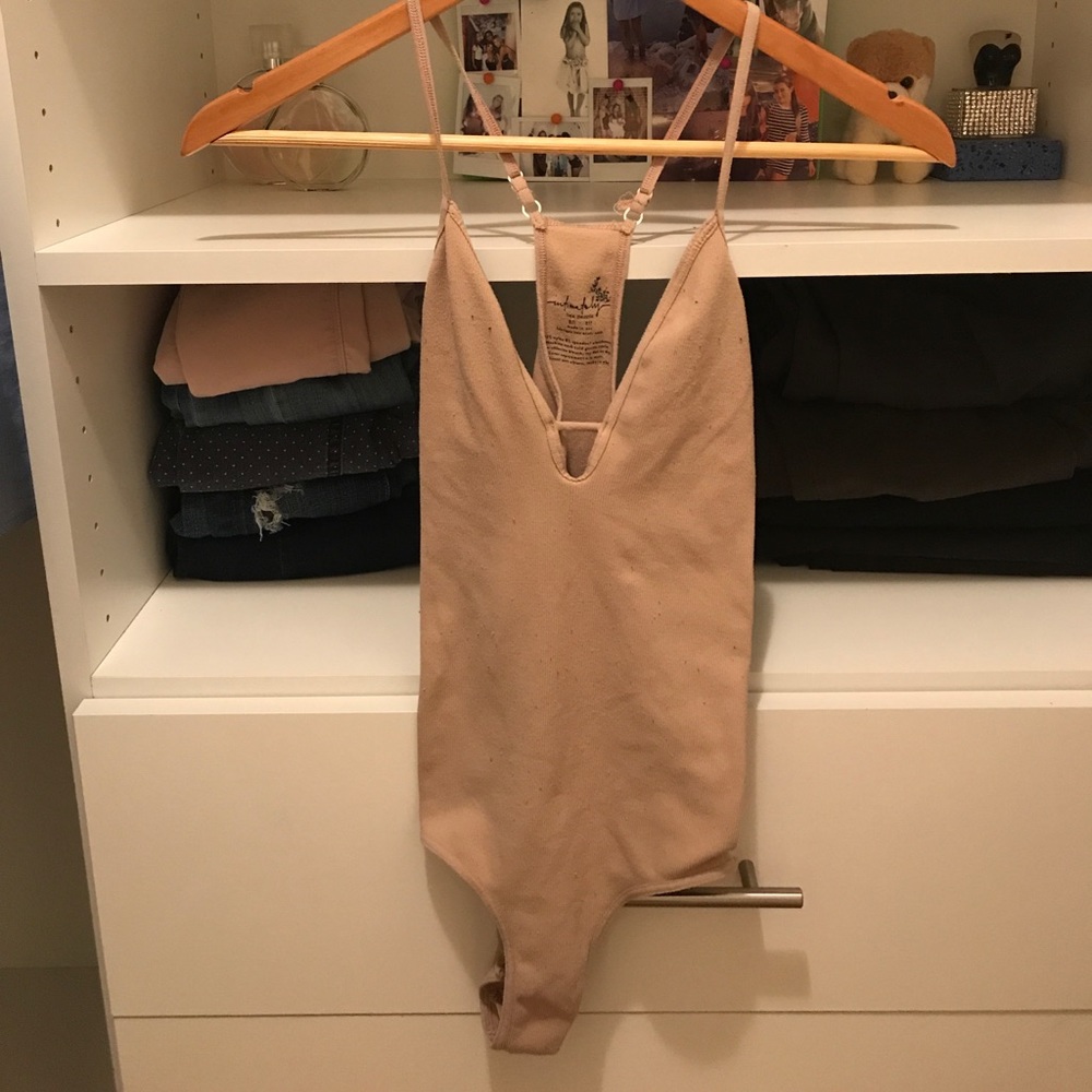 Intimately free people nude body suit