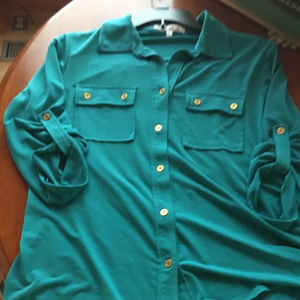 Turquoise button down poly/spandex blouse