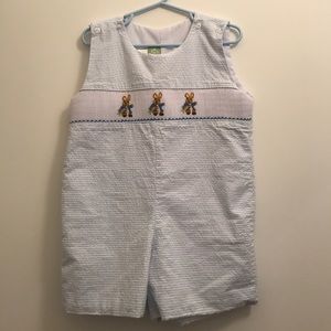 White and light blue seer sucker shortall.