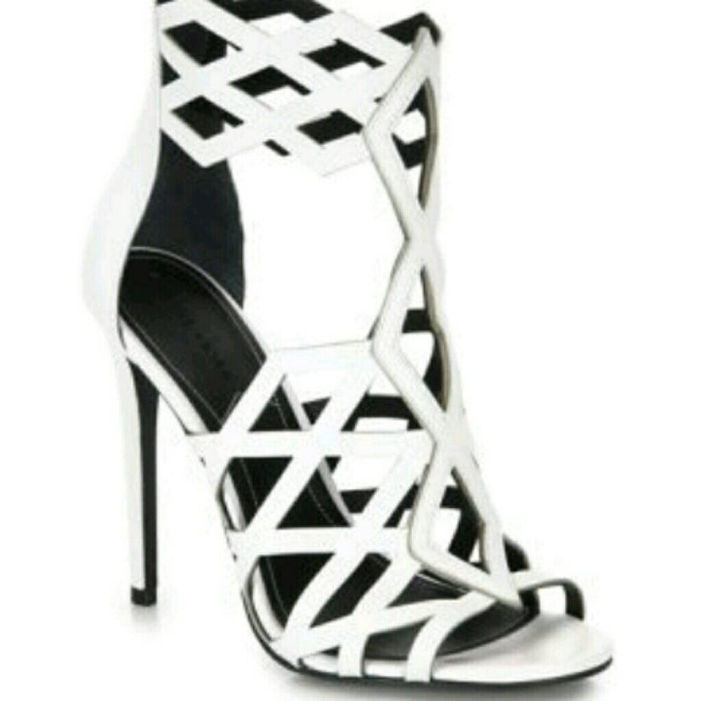 Kylie and Kendall Elena Leather Cages cut out 4"