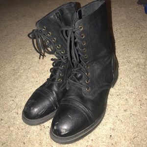 distressed black leather combat boots