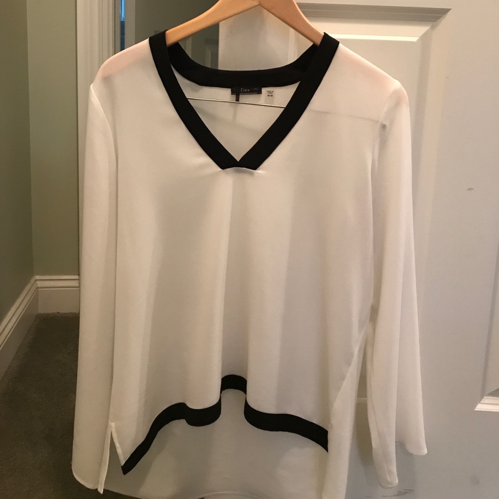 White blouse with black trim