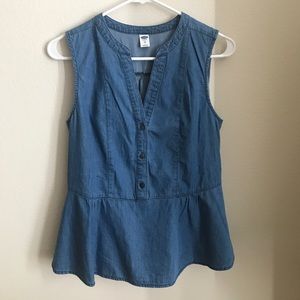 Cute denim blouse. Never been worn.