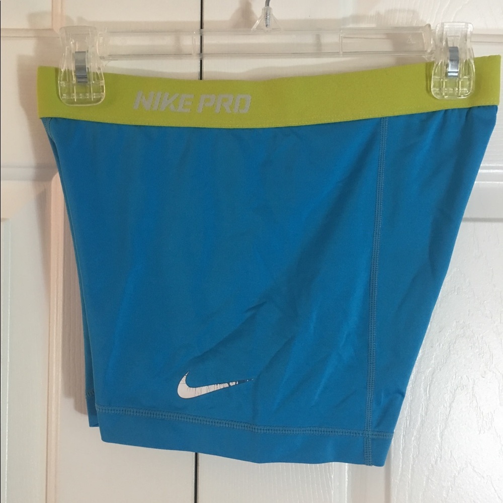 Bright blue Nike Pro spandex shorts