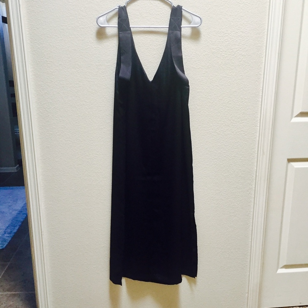 Black V neck cocktail dress.