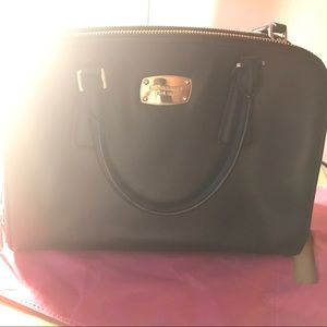 Medium sized Michael Kors crossbody.