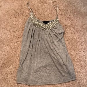 Cute gray top medium with pearl details!