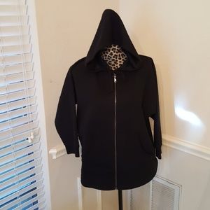 Black quilted knit zip front hooded jacket. Wms Lg