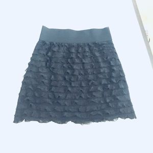 Express balck ruffle skirt with wide band waist.