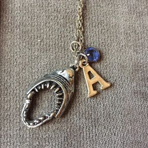 Necklace with shark, A and blue stone charms