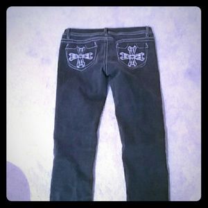Dark pair straight legged jeans.