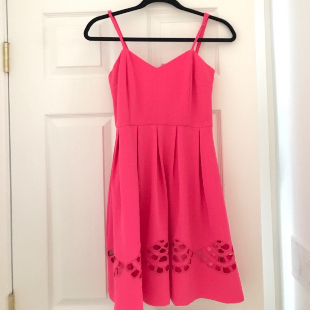 Pink fit and flare dress with cutouts!