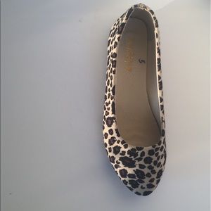 Leopard-print ballet flats.