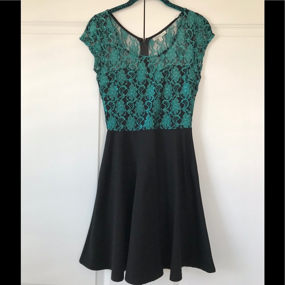 Sparkly emerald and black party dress