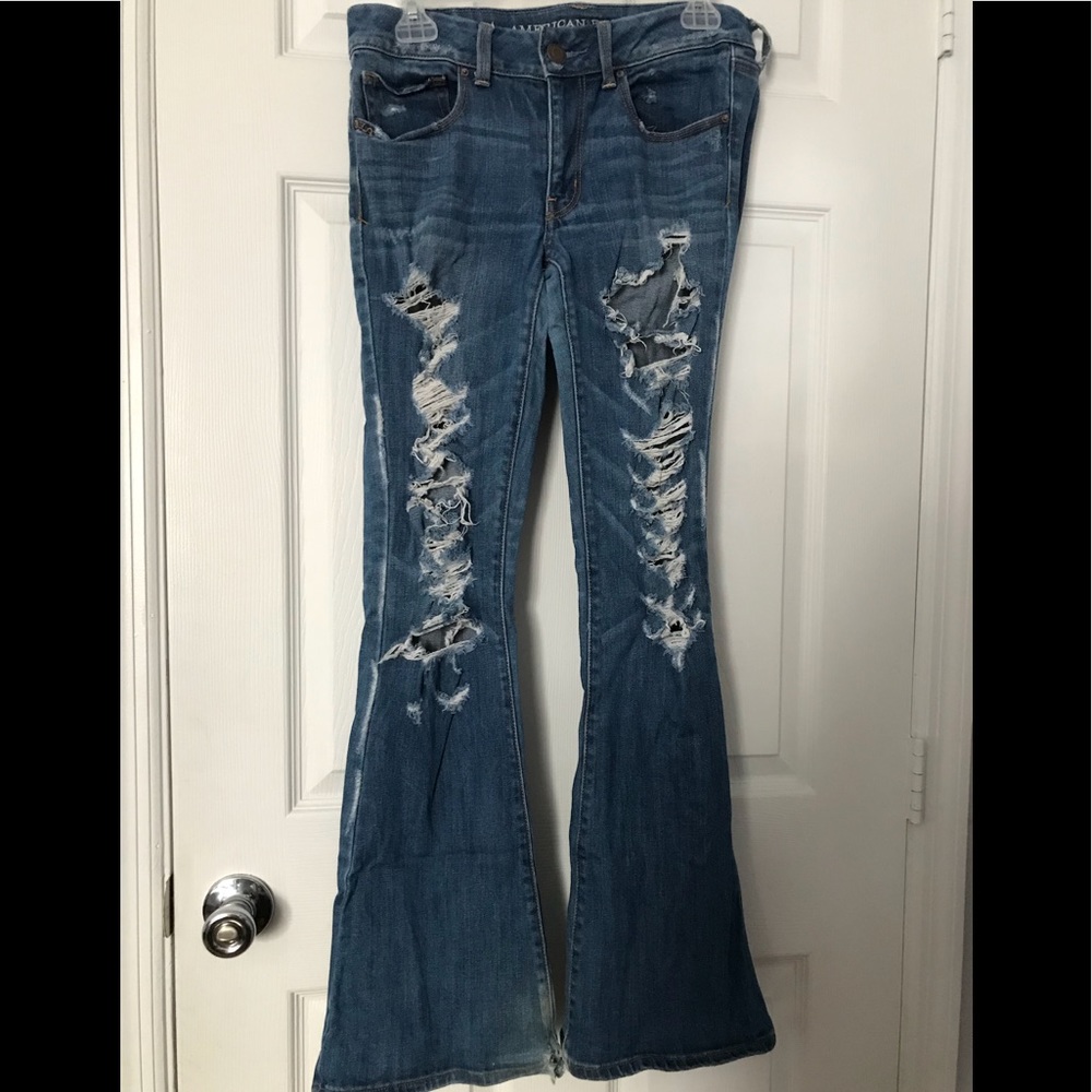 Ripped high waisted bell bottom jeans
