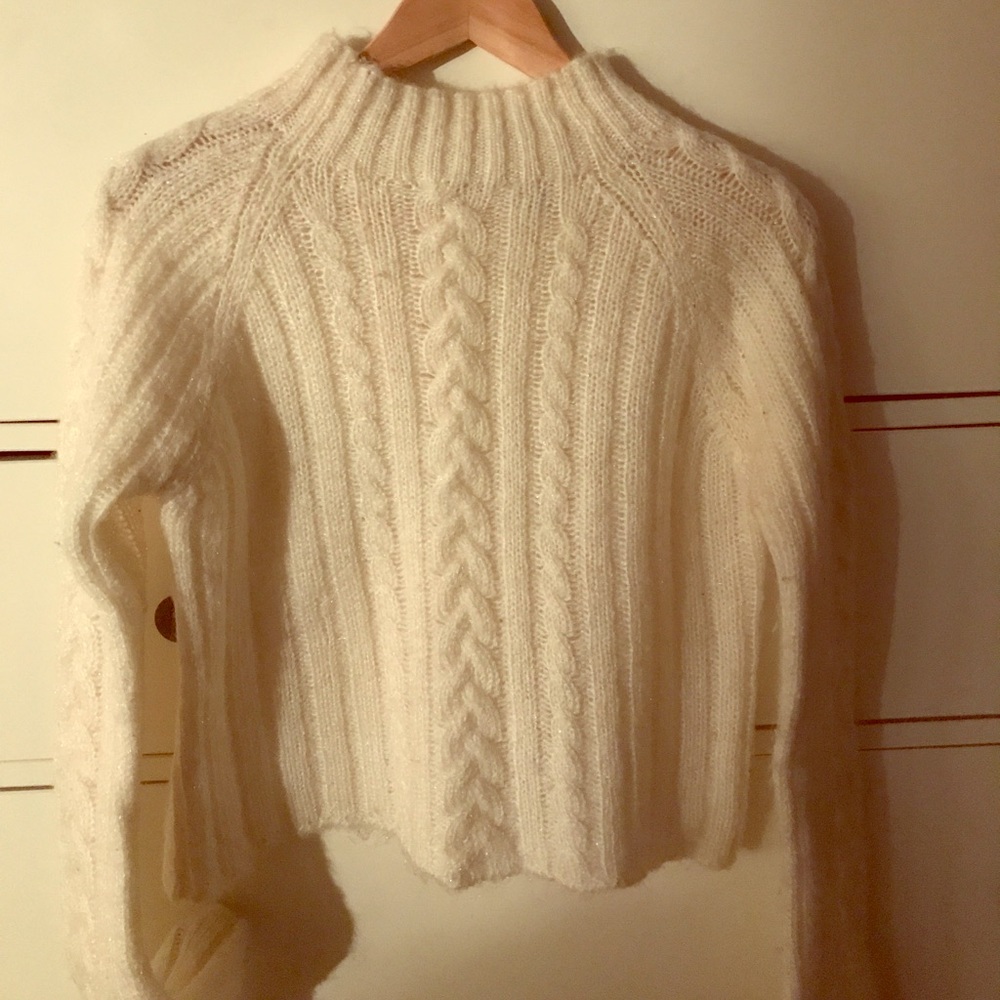 White long sleeve sweater.