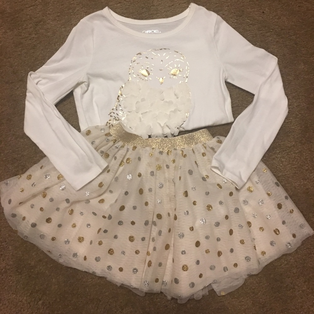 Girls cream skirt with gold and silver polkadots.
