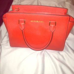 Michael Kors Selma bag in the color mandarin