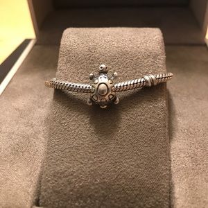 Authentic Pandora sterling silver turtle charm.