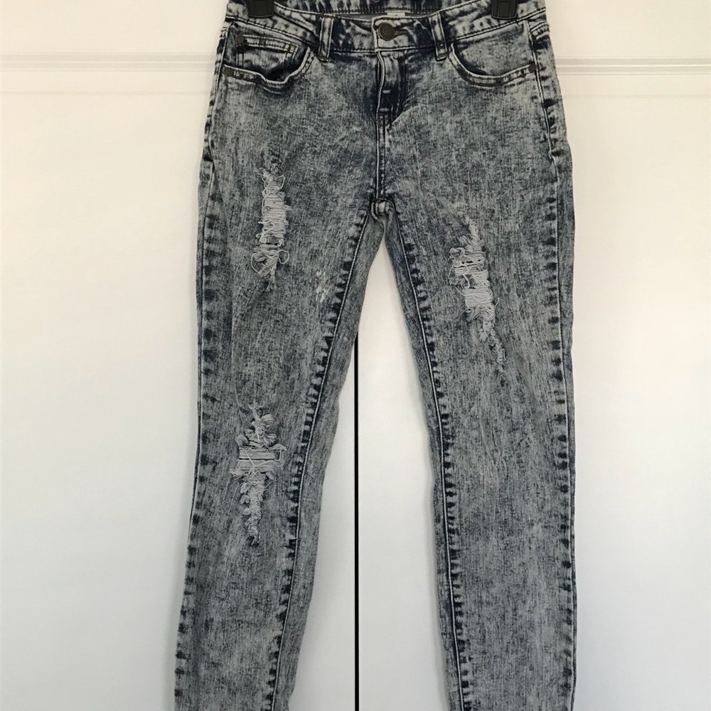 Distressed acid wash jeans