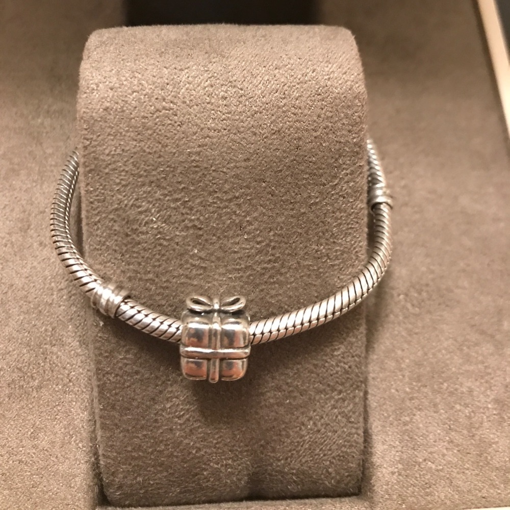 Authentic Pandora gift charm.