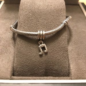 Authentic Pandora music note charm.