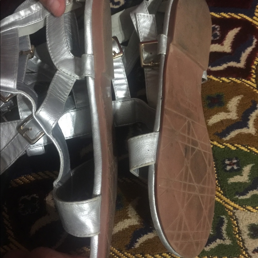 Sliver one flat and one sandal 15$