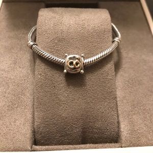 Authentic Pandora rings on a pillow charm