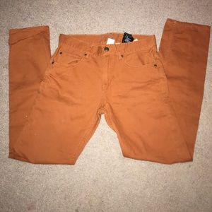 deep orange/brown denim pants