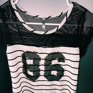 A black/white/gold top from Forever 21