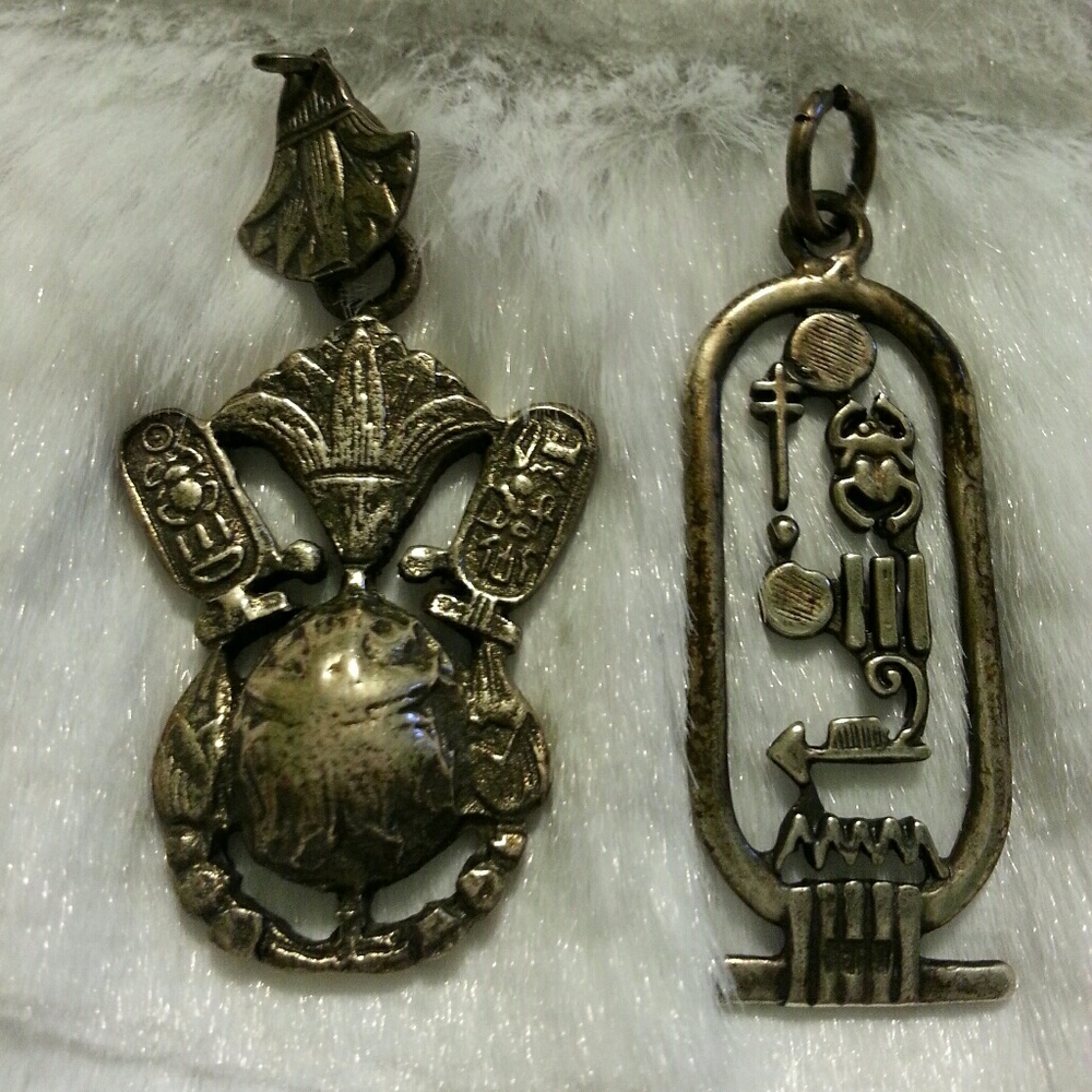 Two Sterling Silver Egyptian Pendants