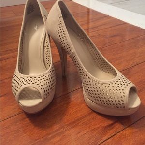 Cream colored size 8.5 high heels