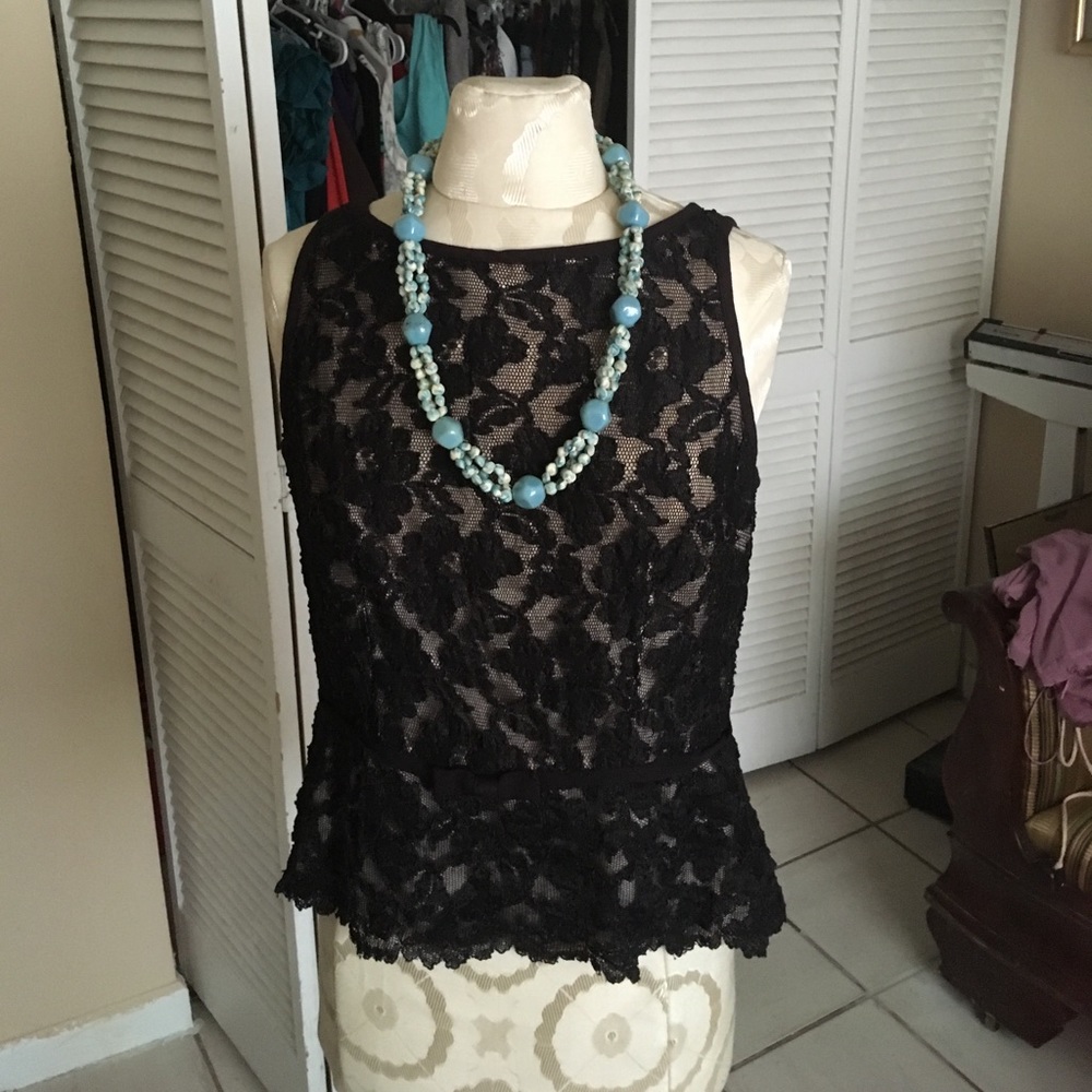 Black design blouse with layers of elegant