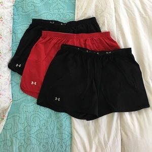 Three pairs of Under Armour knit athletic shorts