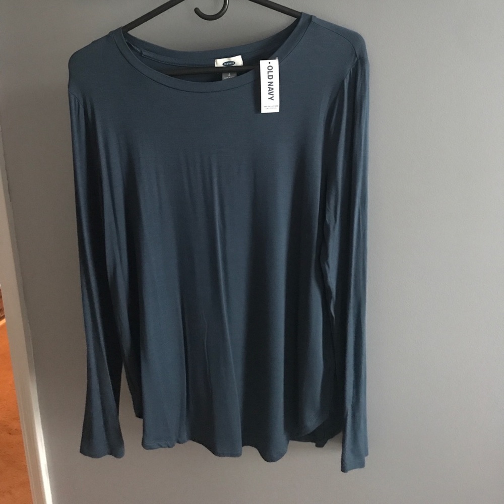 Long sleeve shirt with tag. Never been worn