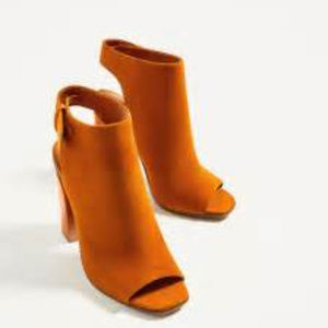 SLINGBACK LEATHER ANKLE BOOTS