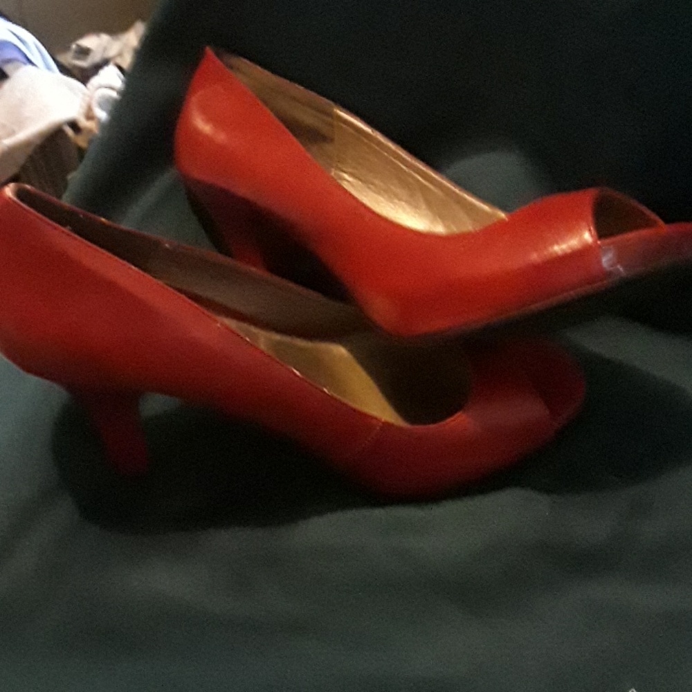 Red open toed pumps