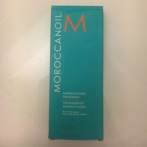 New unopened 3.4oz Moroccan Oil treatment