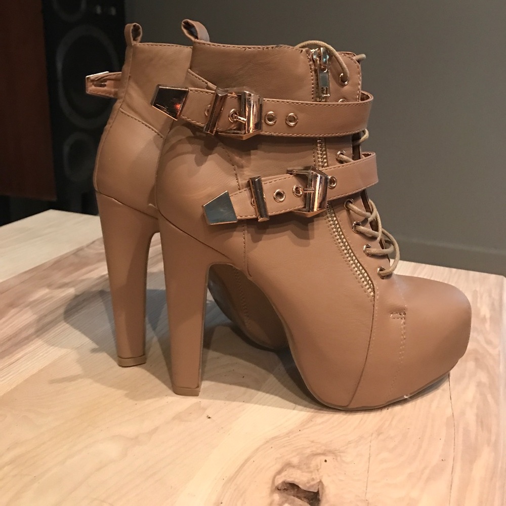 Never worn Size 7 faux leather Booties