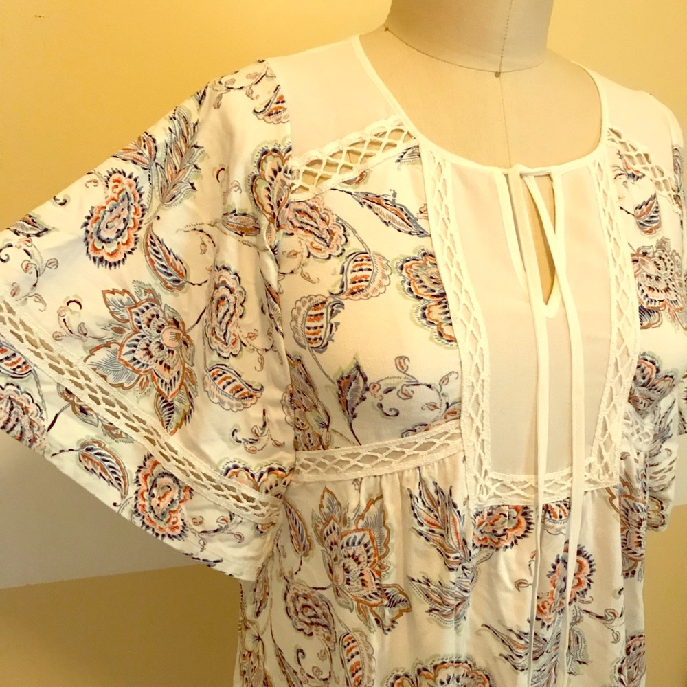 Brand new printed flutter sleeve top