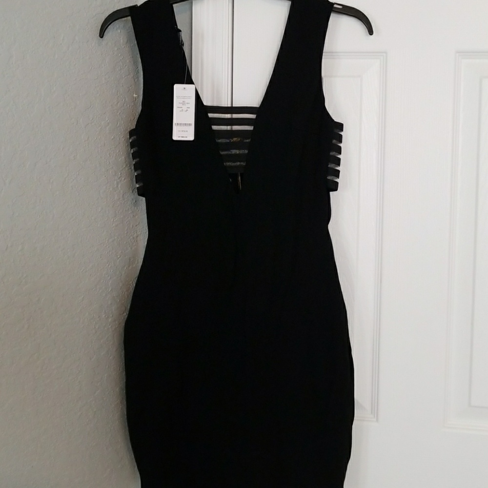 New Bebe black mini dress