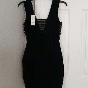 New Bebe black mini dress