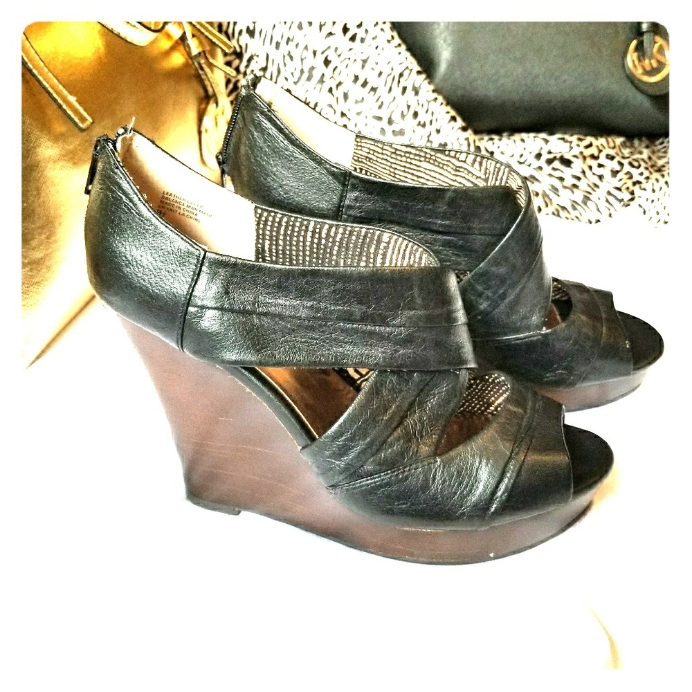 Seychelles black leather wedge.