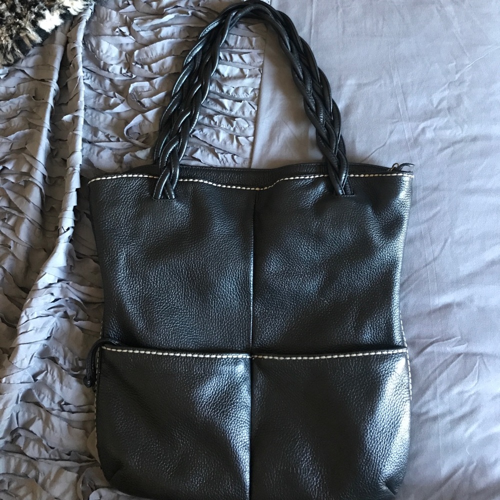 Black leather purse by designer Plinio Visona