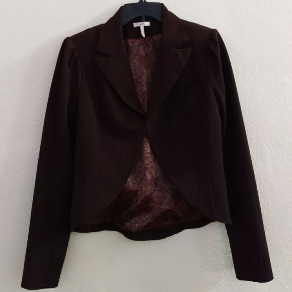 Brown pants suit.