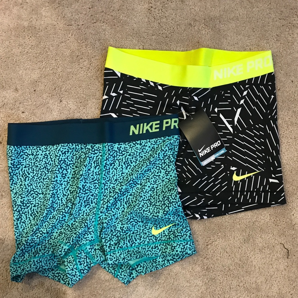 2 pairs of Nike Pro shorts