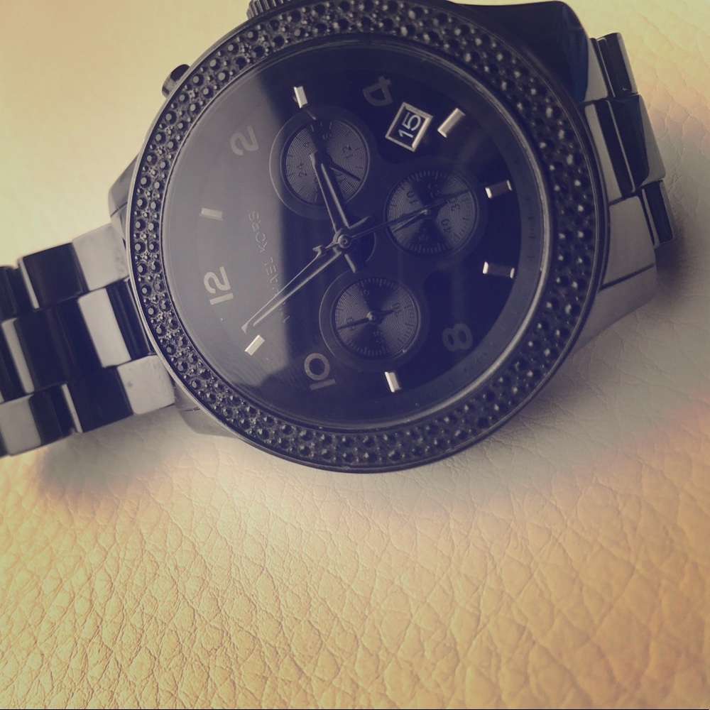Black lady's Michael Kors watch