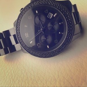 Black lady's Michael Kors watch