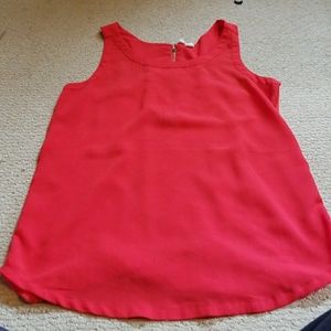 Red racer back style blouse.