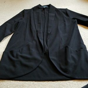 Never worn. Size small black blazer.